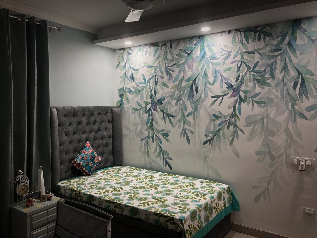 Bedroom with a watercolour leaf mural