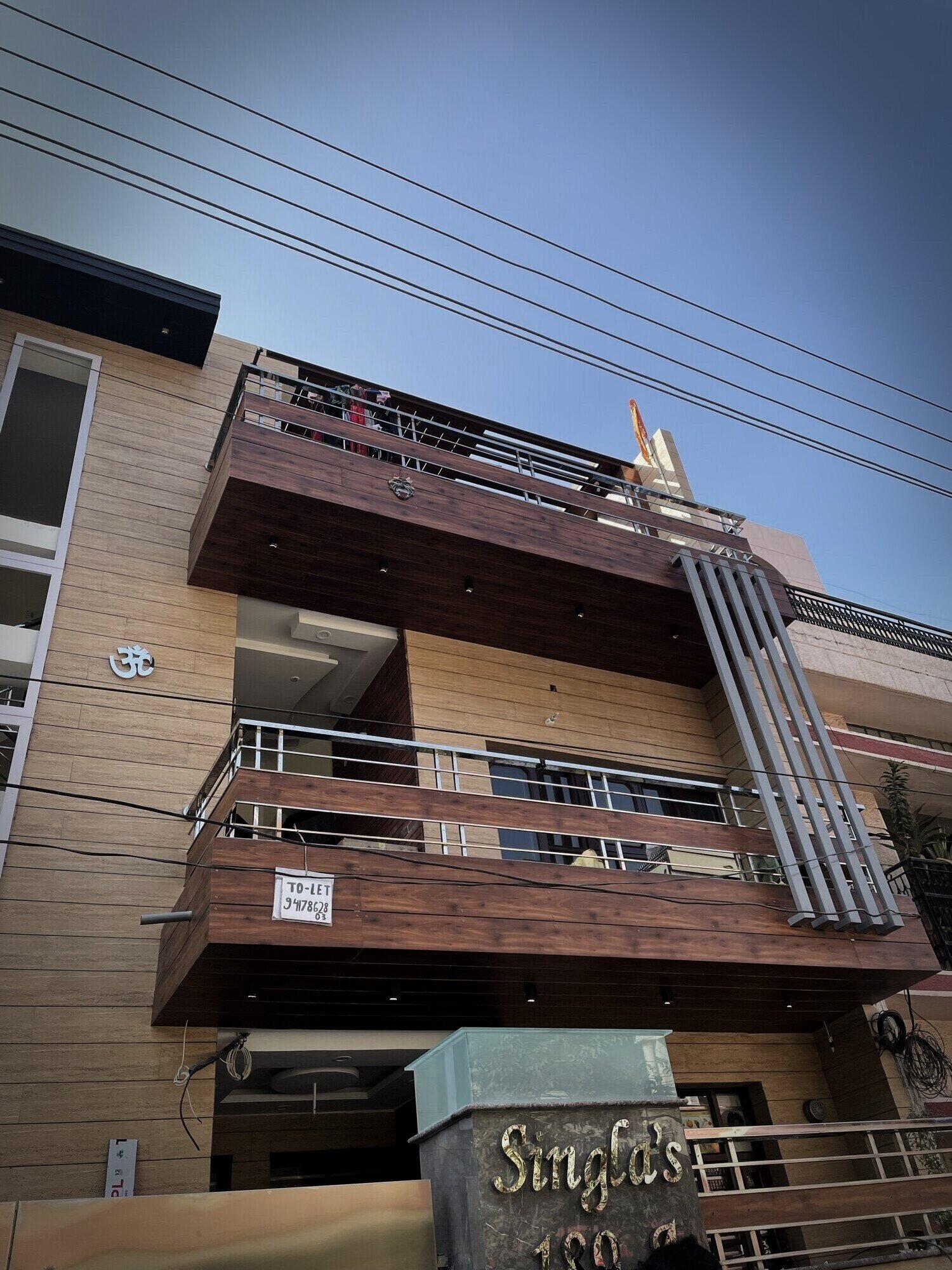 Façade with vertical timber louvres